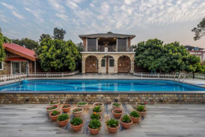 StayVista at Dudly Manor with Swimming Pool